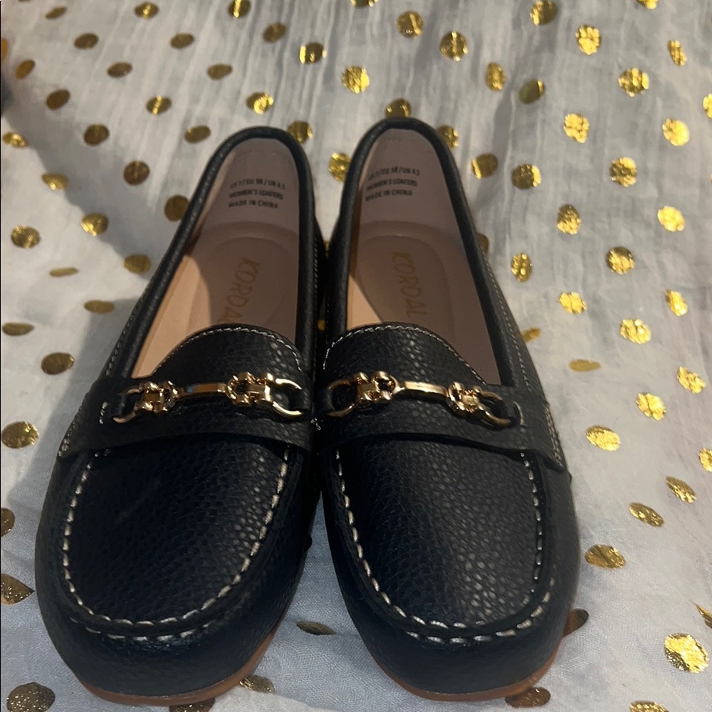 Black Pebbled Leather Slip-On Loafers with Gold Bit Detail